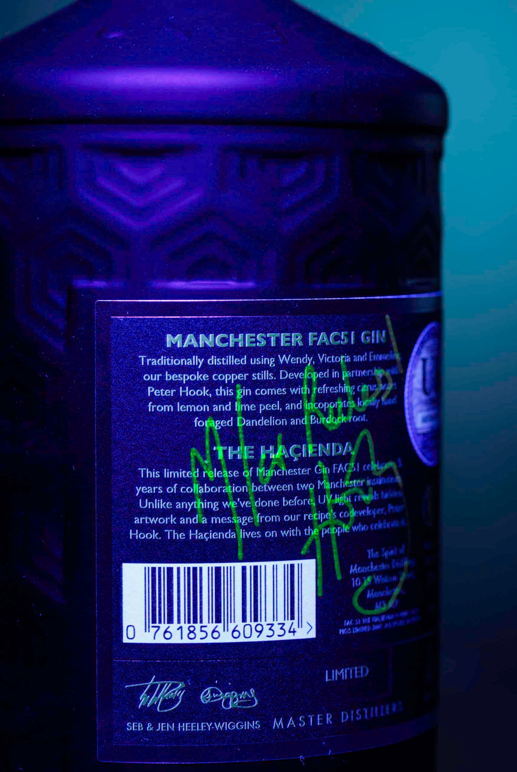 Limited Edition Haçienda Gin bottle showcasing traditional distillation and vibrant design, made in Manchester.