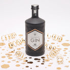 Manchester Gin 10th Anniversary Edition bottle with metallic anniversary label celebrating 10 years of distilling